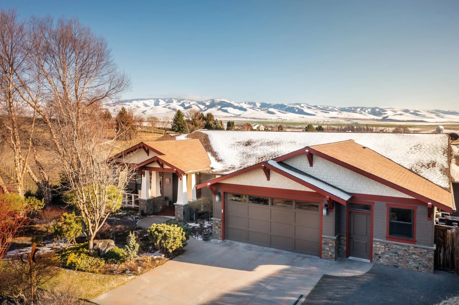 A home below the snowy Blue Mountains
